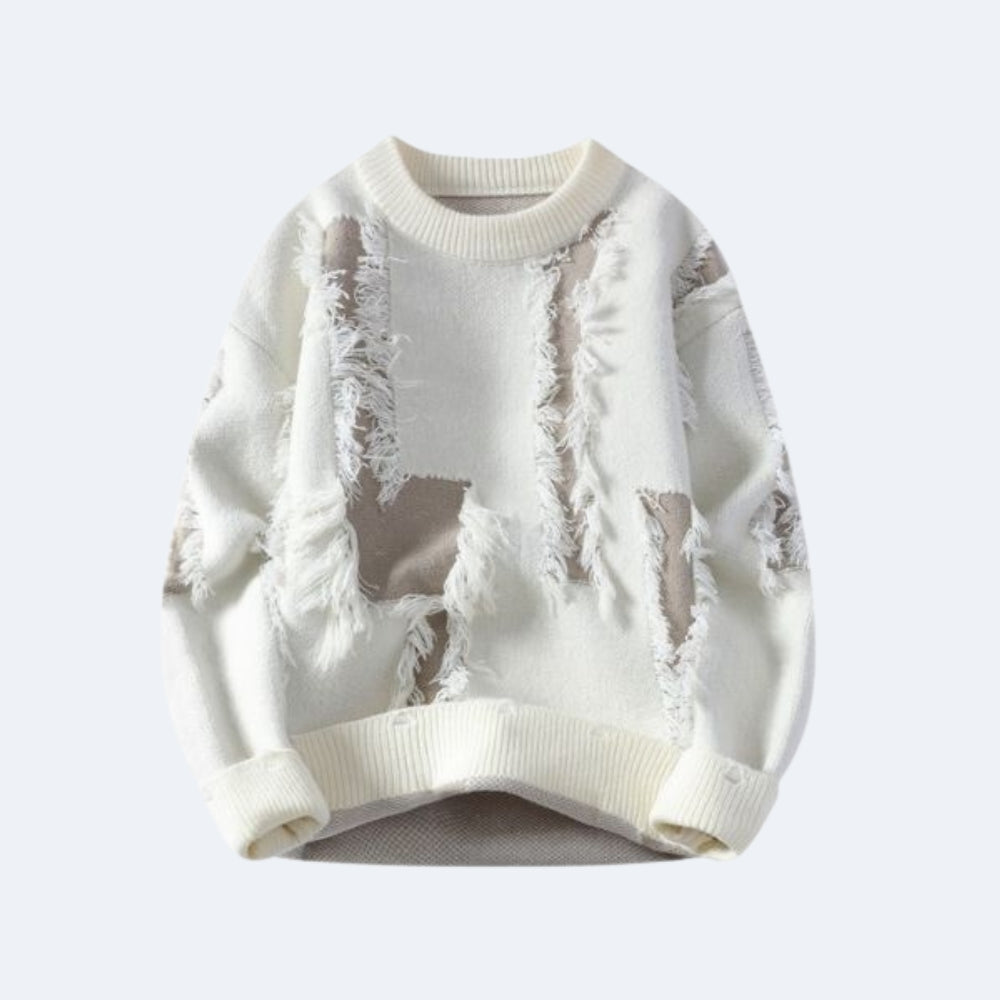 White. A cream-colored knit sweater with a distressed, ripped design showing beige lining.