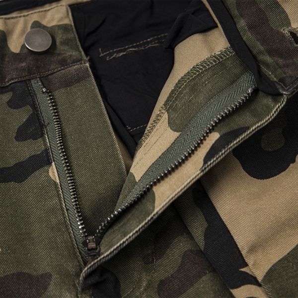 Close-up of a camouflage jacket with a zipper