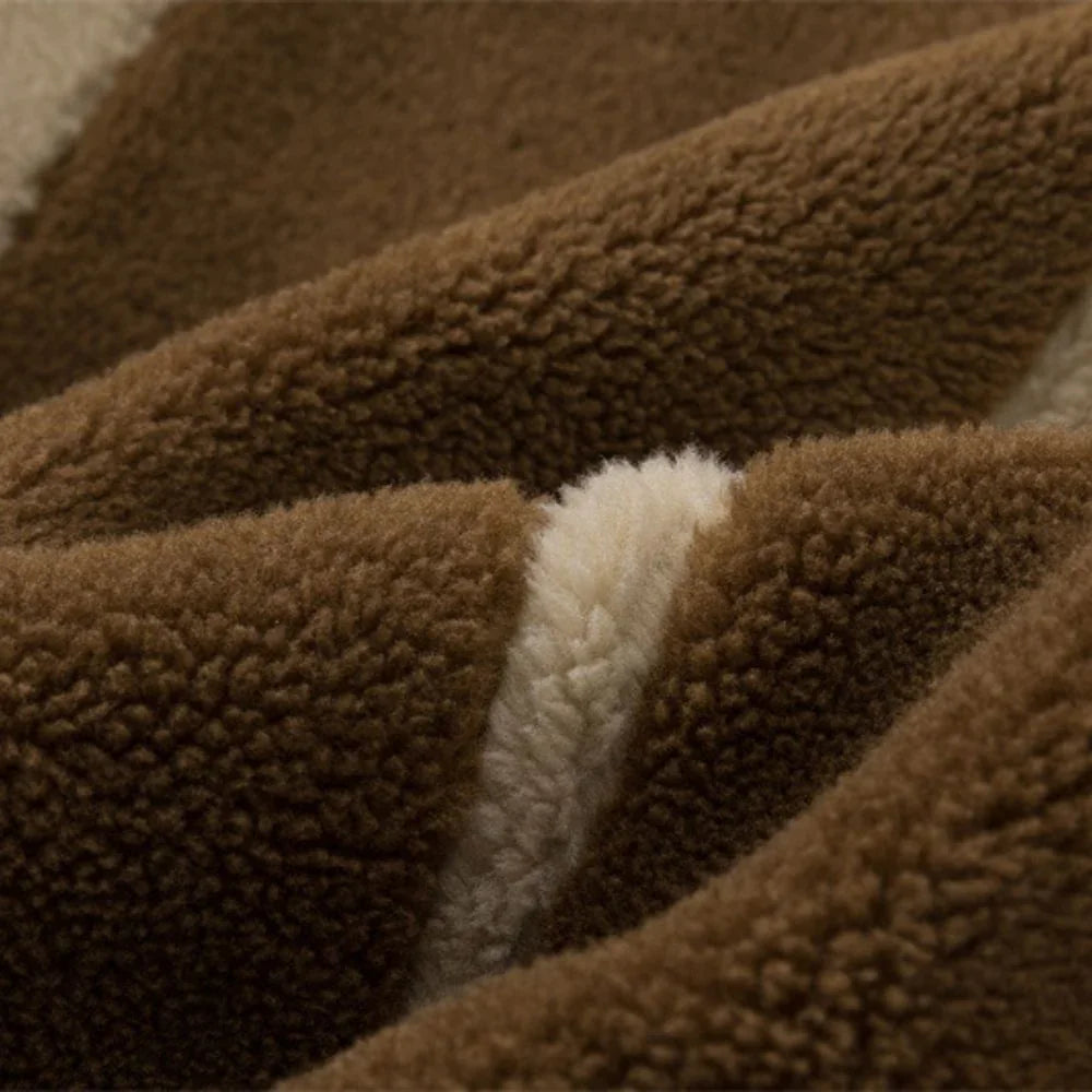 Close-up of brown textured fabric with a white stripe