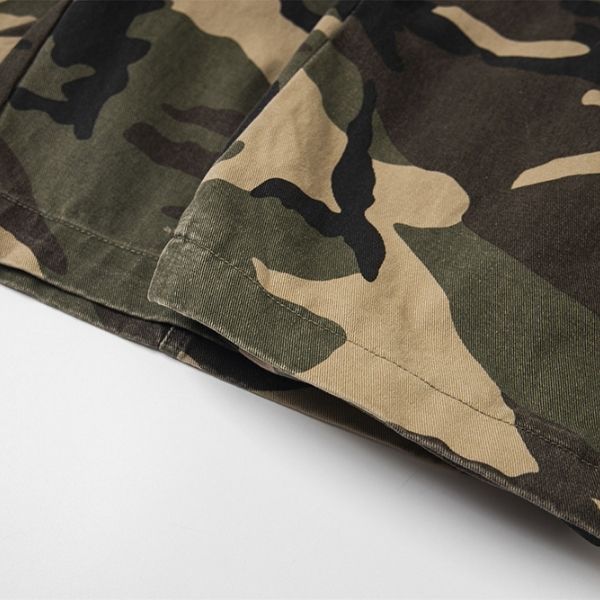 Close-up of camouflage fabric on a white background