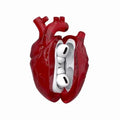Heart-shaped case with wireless earbuds on a white background