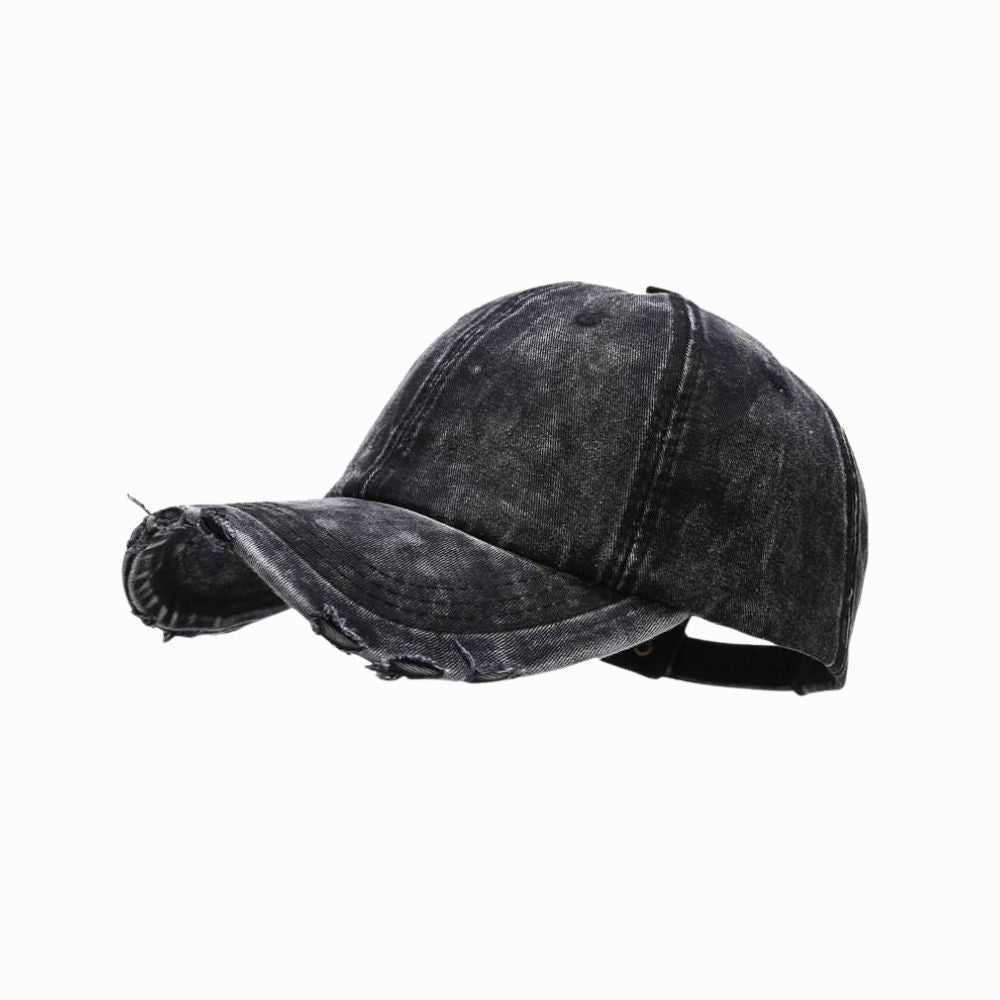 Black denim cap on a white background