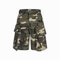 Camouflage cargo shorts on a white background