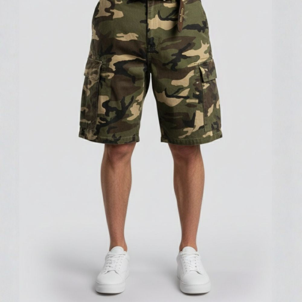 Camouflage shorts worn by a person on a white background