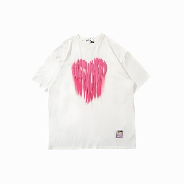White t-shirt with pink heart design on a white background