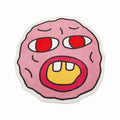 Cartoonish rug pink character with red eyes and a yellow mouth on a white background