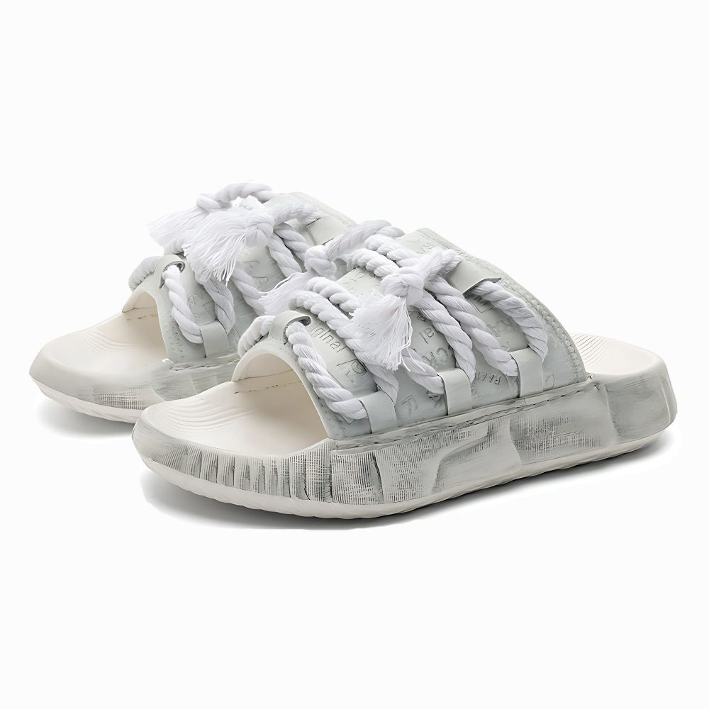 White sandals with gray accents on a white background