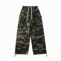 Camouflage pants with multiple pockets on a white background