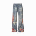 Distressed jeans with floral patterns on a white background