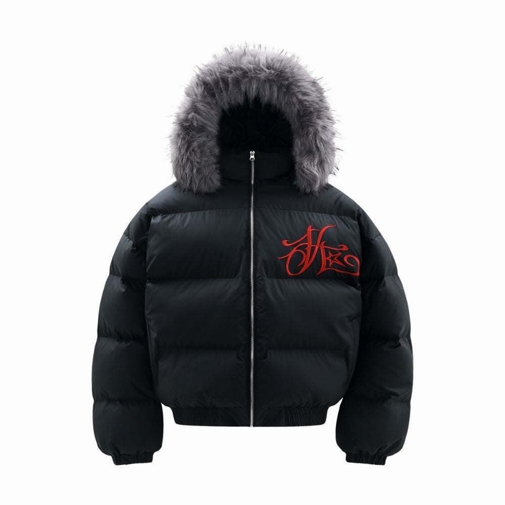 Black puffer jacket with fur hood and red logo on a white background