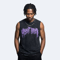 A man with black dreadlocks wearing a dark gray washed sleeveless tank top with a purple 'HEAD GEAR' logo, standing against a light gray background.