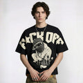 Person wearing a black t-shirt with graphic design and text