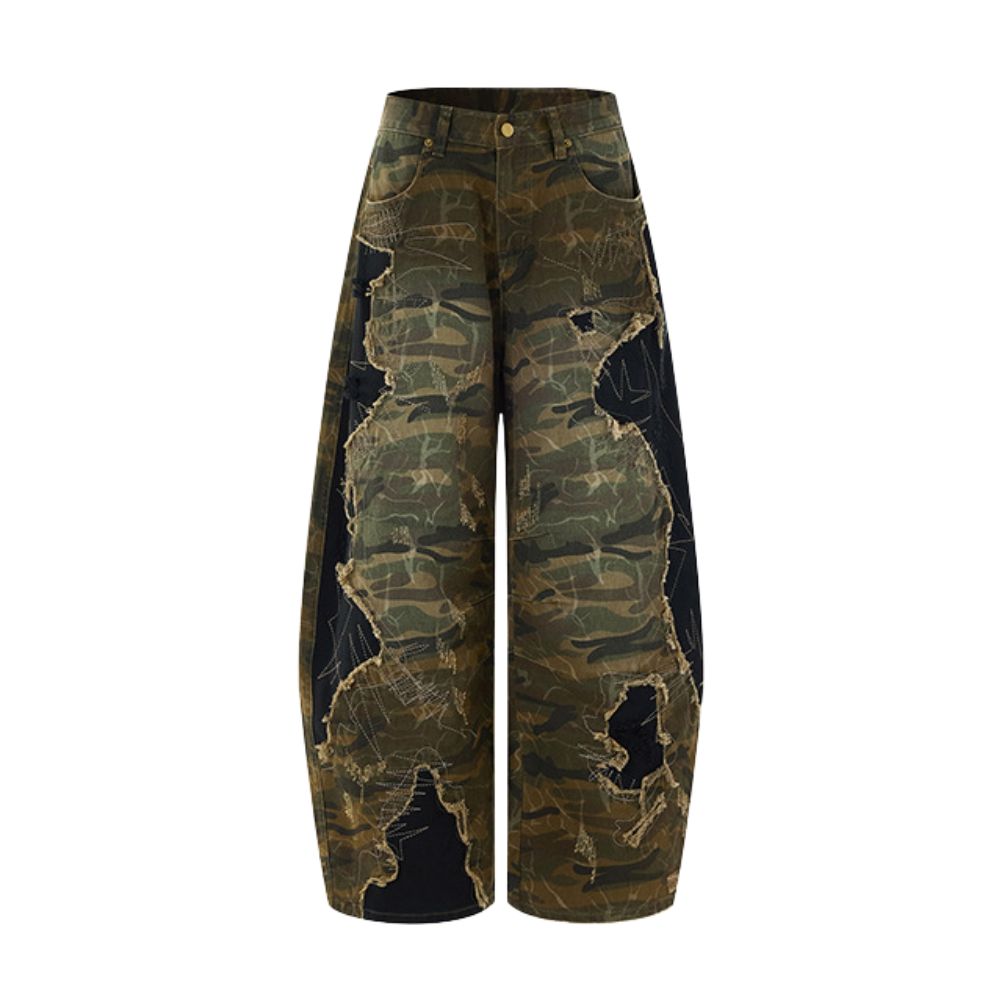 Camouflage pants with black patches on a white background