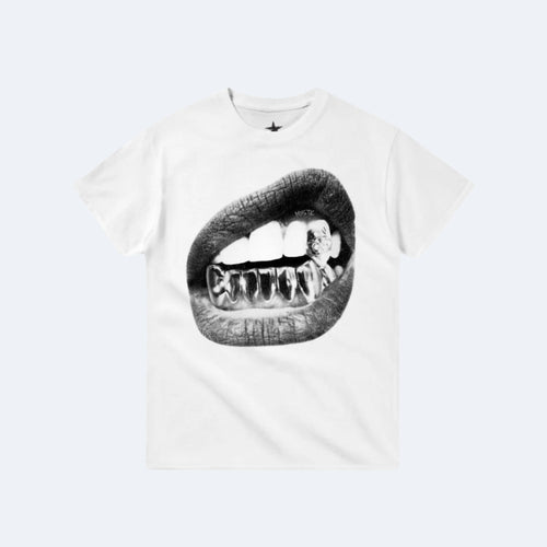 White. A white short-sleeve crewneck t-shirt featuring a large black and white graphic print of a mouth with gold-grill teeth on the front.
