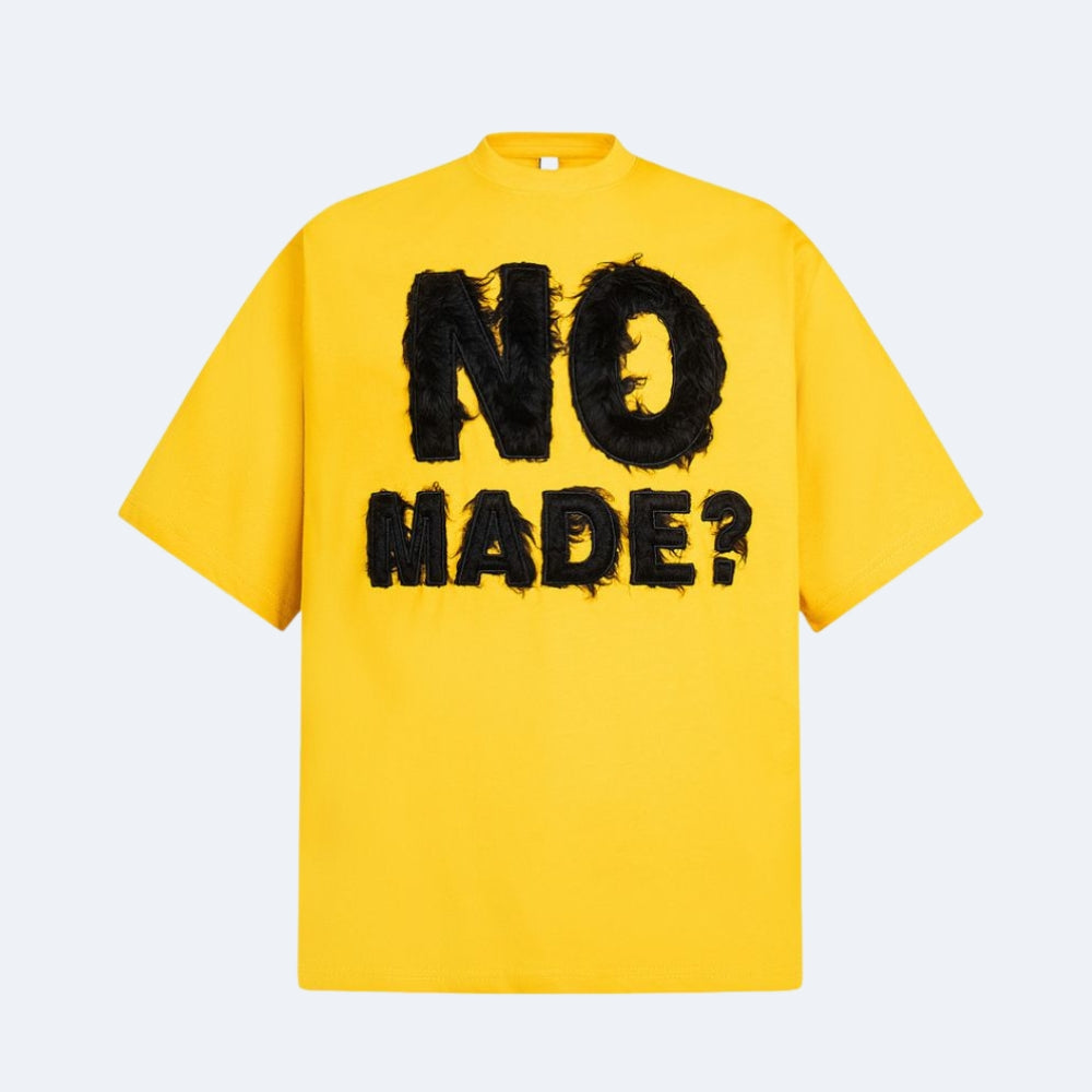 Yellow. The KRUX No Made tee in yellow with textured lettering, shown flat.