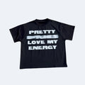 Black. A black t-shirt with white text, shown against a white background.