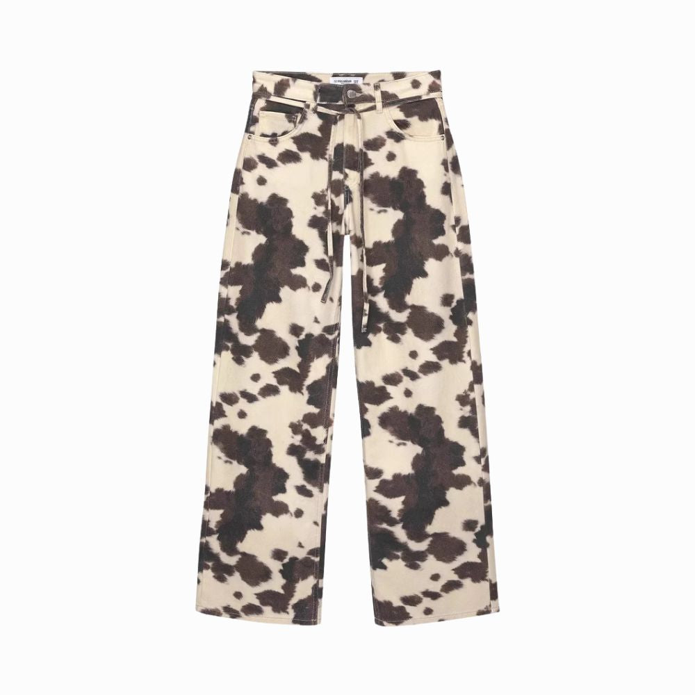 Cow print pants on a white background