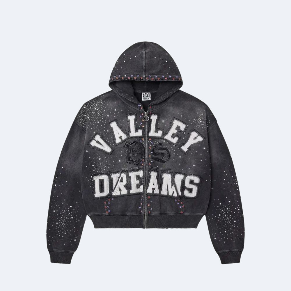Black. A cropped zip-up hoodie in washed black with white VALLEY DREAMS text and a black graphic, decorated with small multicolor rhinestone accents along the hood and cuffs.