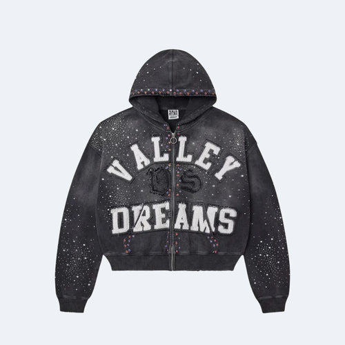 Black. A cropped zip-up hoodie in washed black with white VALLEY DREAMS text and a black graphic, decorated with small multicolor rhinestone accents along the hood and cuffs.