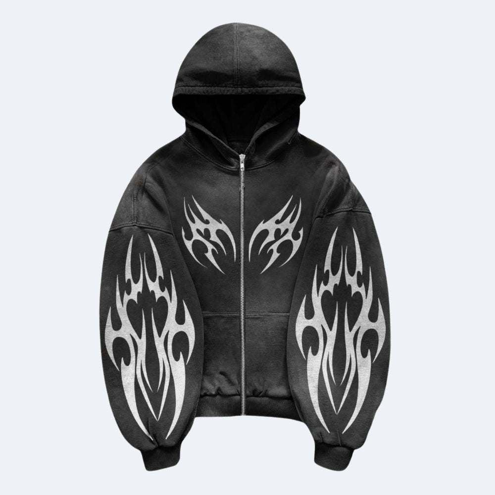Black. A black zip-up hoodie with a silver zipper, black hood, and ribbed cuffs and hem, decorated with large white tribal flame patterns on the sleeves and chest.