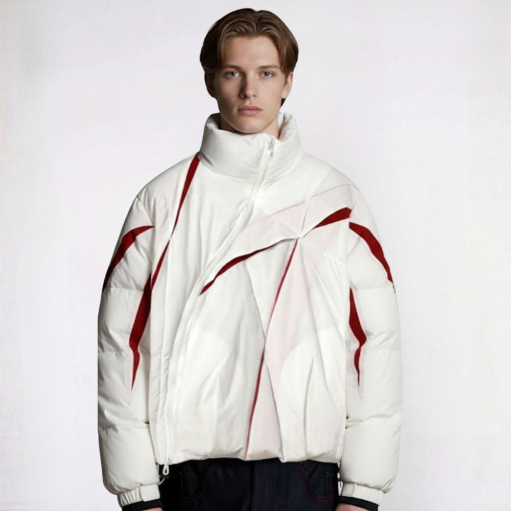Person wearing a white jacket with red accents on a plain background
