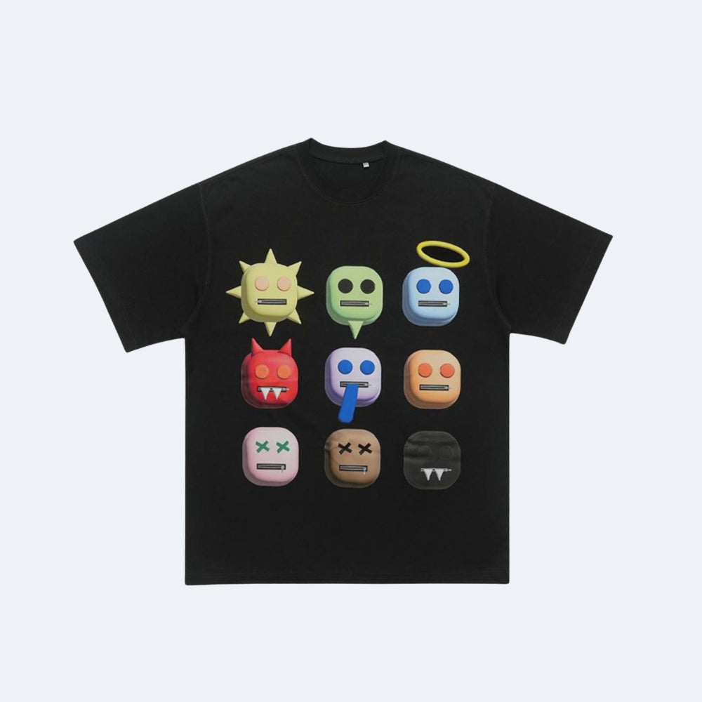 Black. A black short-sleeve crewneck t-shirt featuring a graphic print of nine colorful, stylized emoji-like faces arranged in a 3x3 grid on the front.