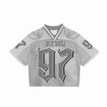 Gray sports jersey with 'INZINCT' branding on a white background