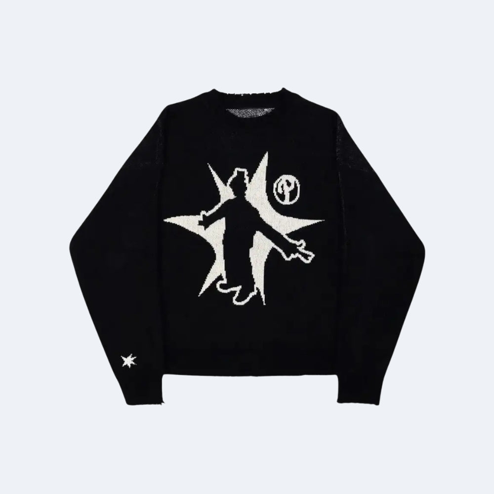 A black crewneck sweater featuring a large white graphic of a figure breaking through a starburst on the front, with a small white star on the left sleeve, shown against a light gray background.
