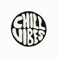 Round black rug with 'Chill Vibes' text on a white background