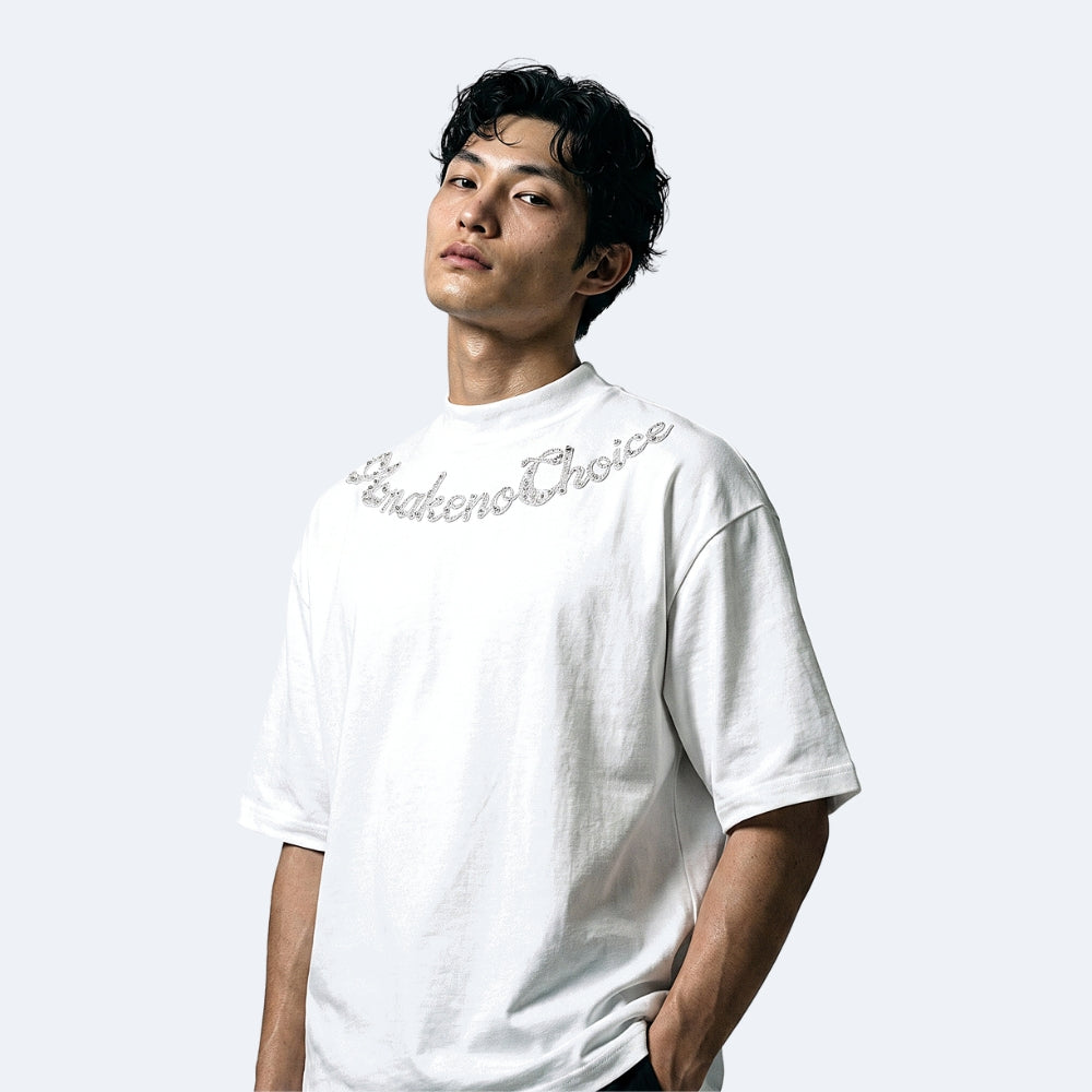 White. A man wearing a white short-sleeve t-shirt with Sakuto Choice written across the chest in a silver cursive script.