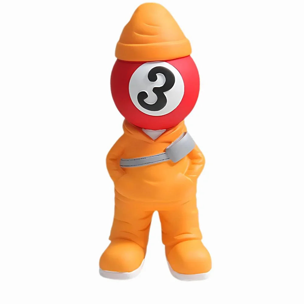 Toy figure with a red ball on top, wearing an orange outfit and hat, on a white background