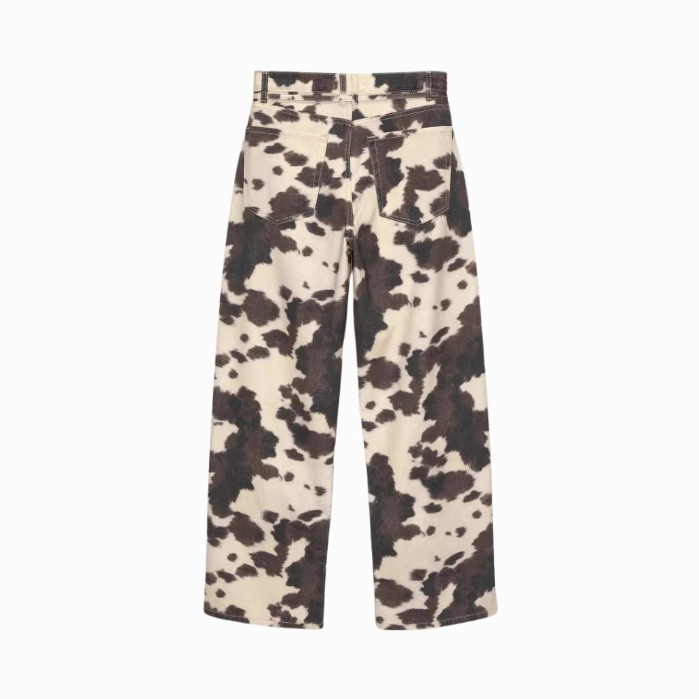 Cow print pants on a white background