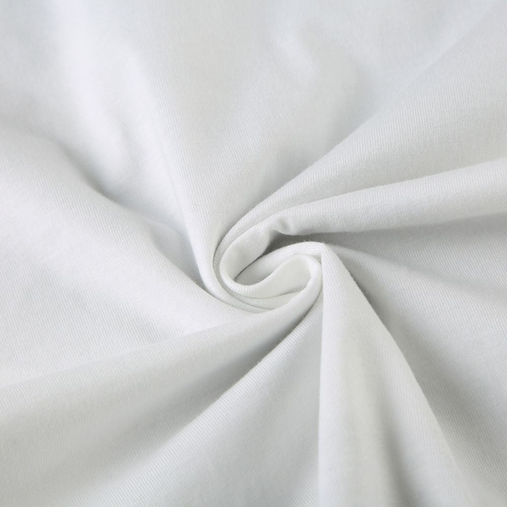 Close-up of light gray fabric with folds