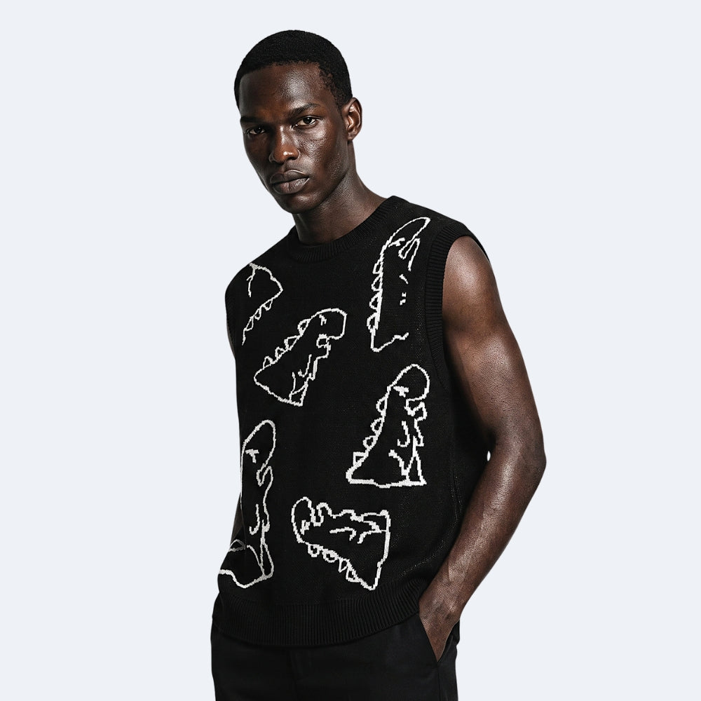 Black. A man wearing a sleeveless black knit sweater vest with white abstract line-art motifs.