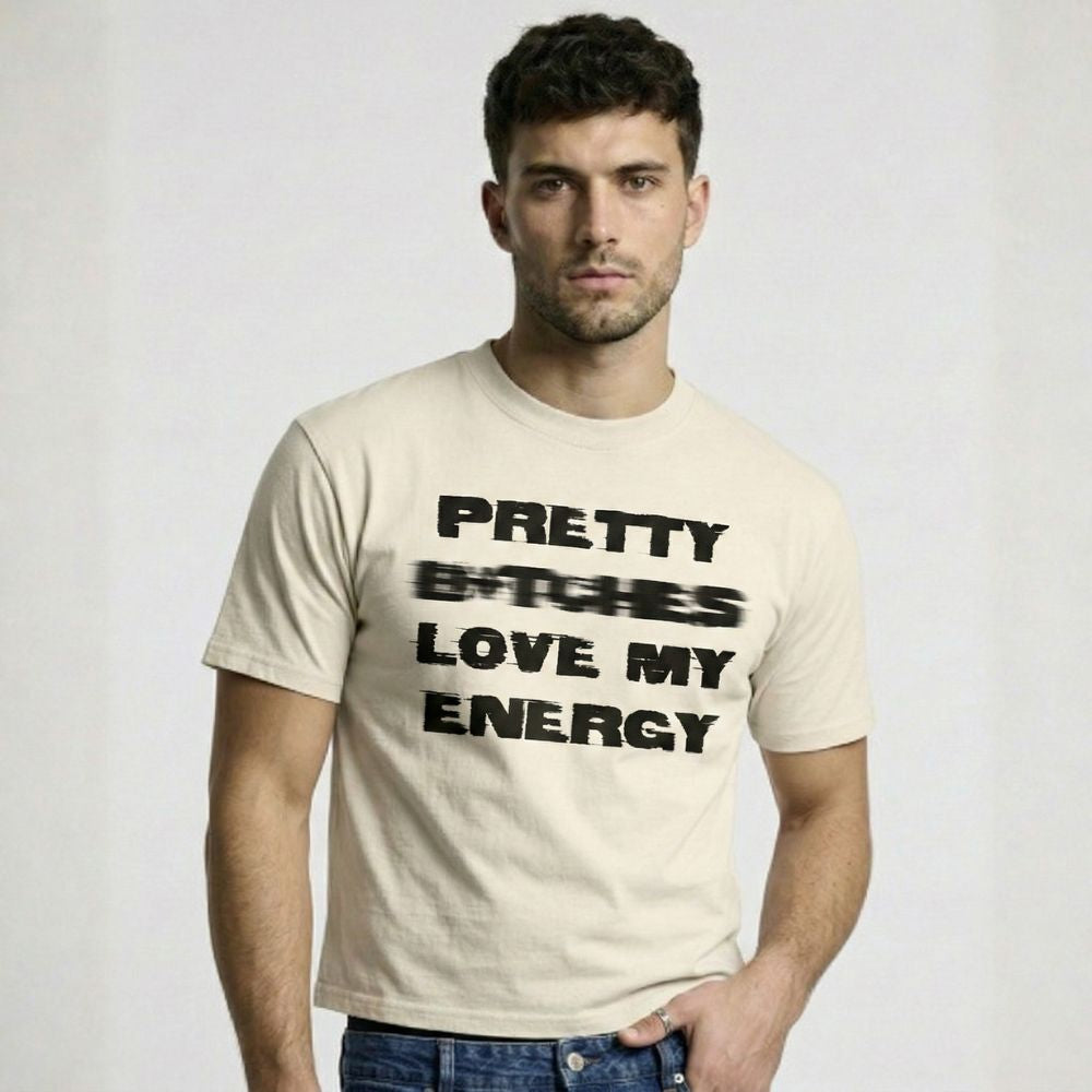 Man wearing a beige t-shirt with text on a plain background
