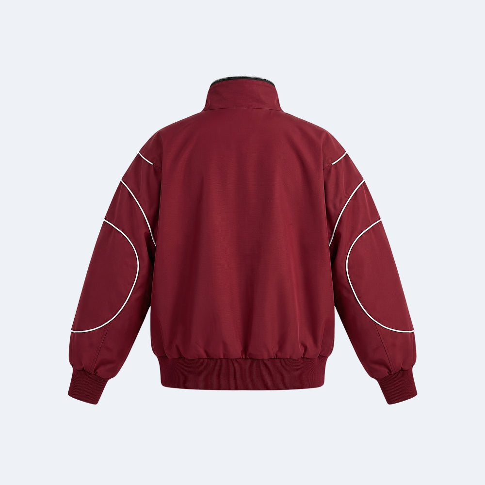 A maroon bomber jacket shown from the back, featuring white contrast piping along the shoulders and upper arms, set against a light gray background.