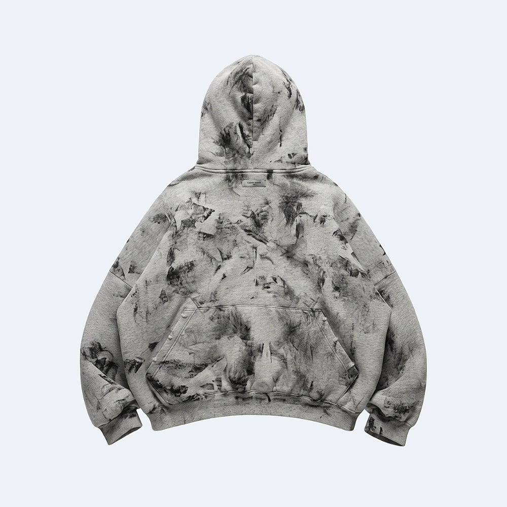 A gray and black tie-dye hoodie with a front kangaroo pocket, shown from the back against a light gray background.