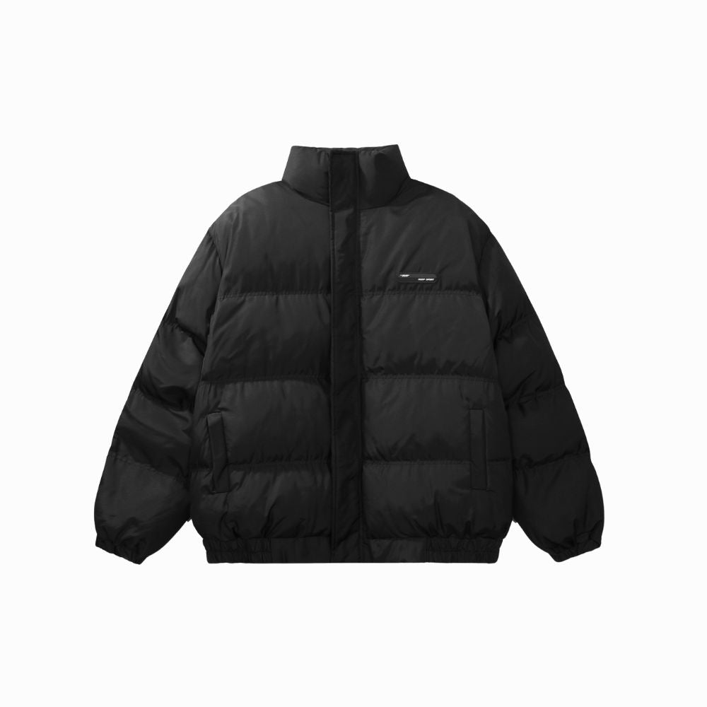 Black puffer jacket on a white background