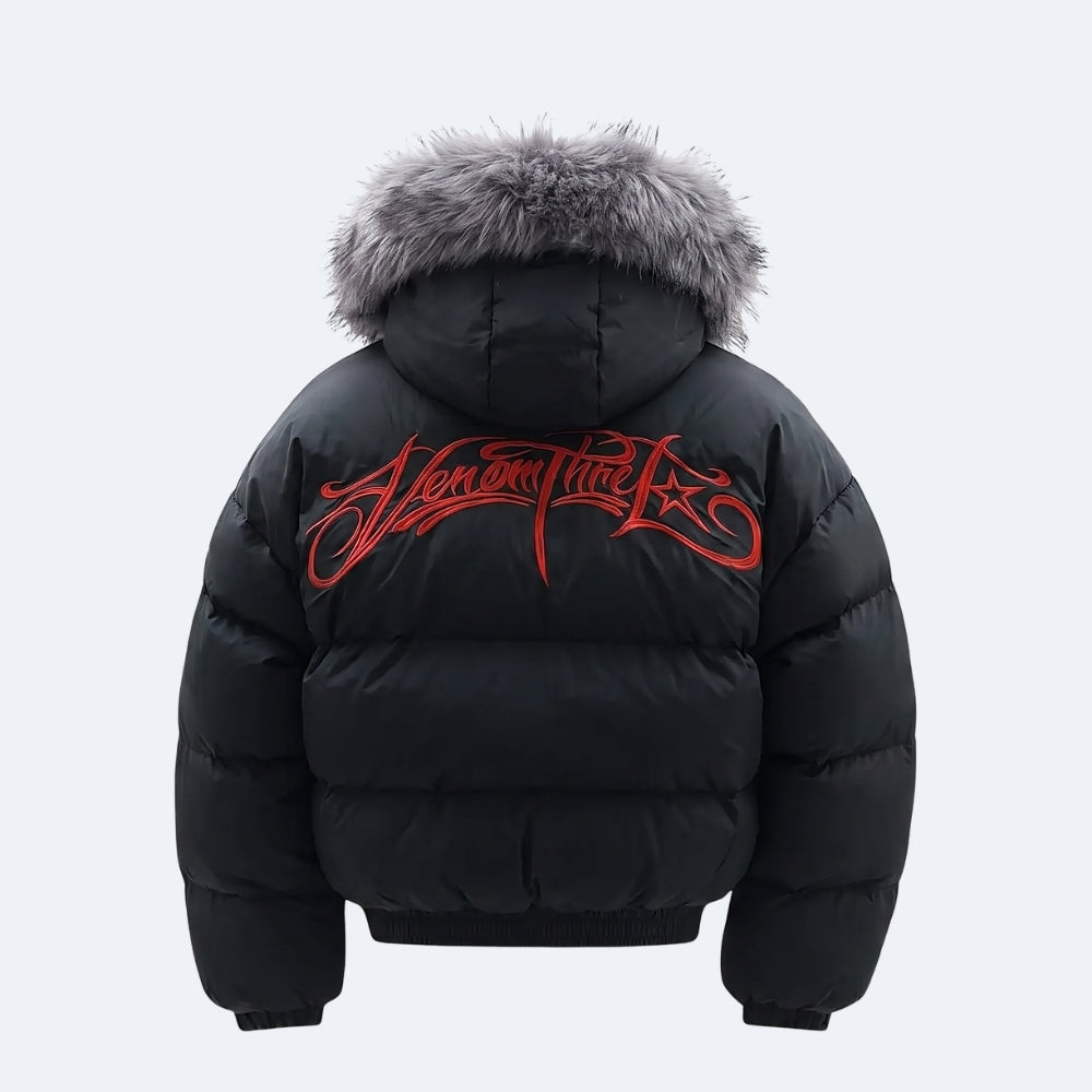 Black puffer jacket with a gray faux-fur trimmed hood and a red gothic-style script logo on the back, shown on a light gray background.