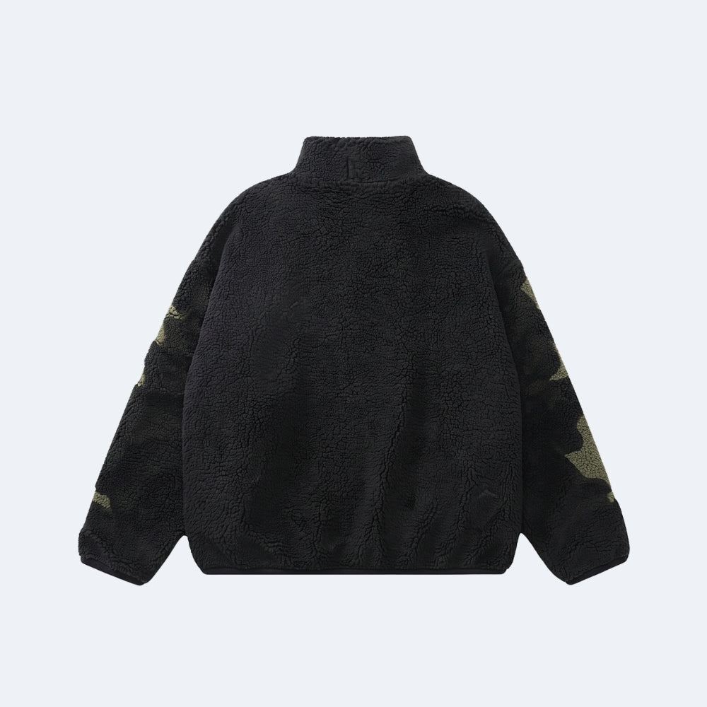 Black. A black sherpa fleece jacket with camouflage patterned details on the sleeves, shown from the back.