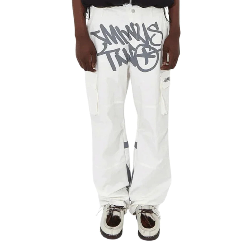 White pants with black and gray text and symbols on a white background