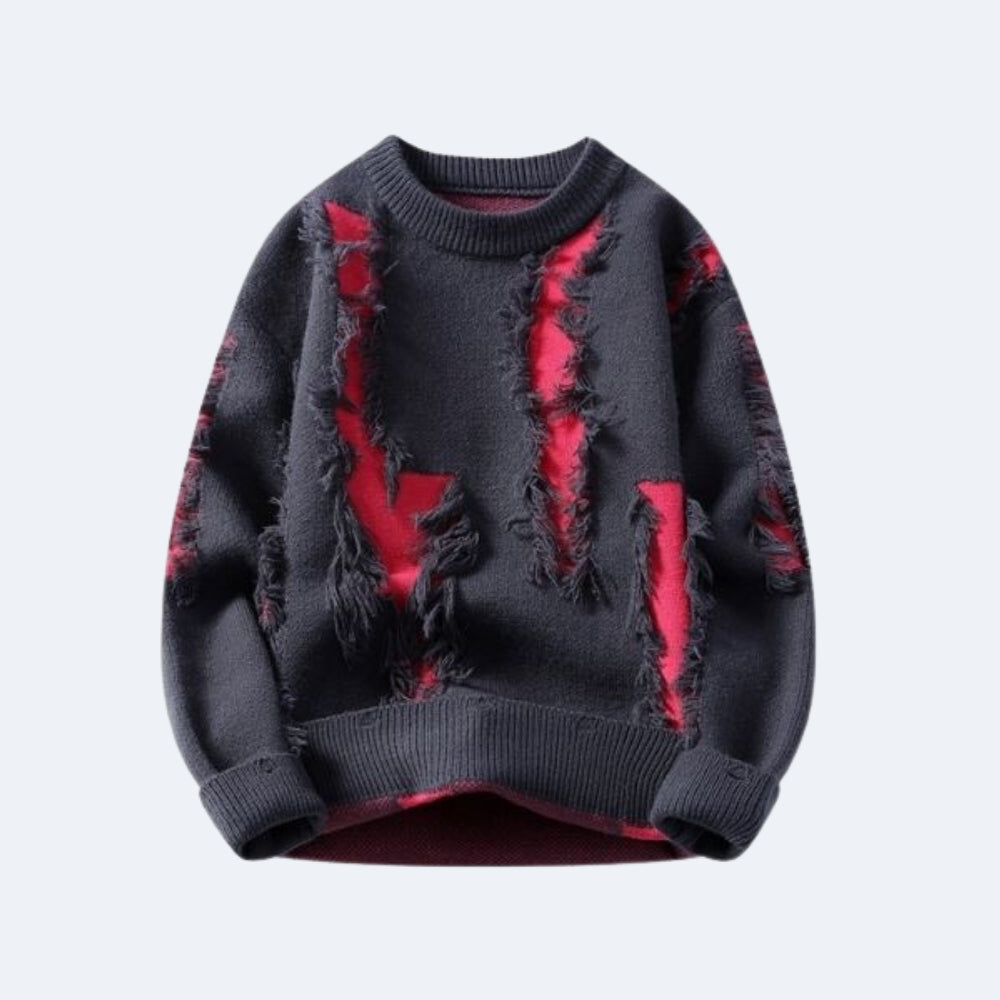 Gray Red. A dark gray crewneck sweater with distressed, ripped details revealing a red lining.