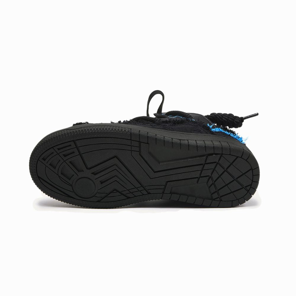 Black sneaker with blue accents on a white background