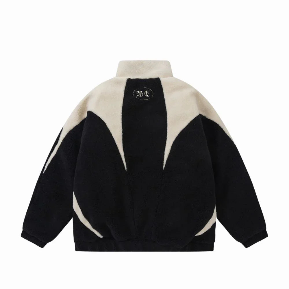 Black and beige fleece jacket with a logo on the back against a white background