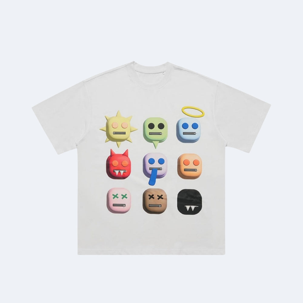 White. A white short-sleeve crewneck t-shirt featuring a graphic print of nine colorful, cute cartoon face icons arranged in a 3x3 grid.