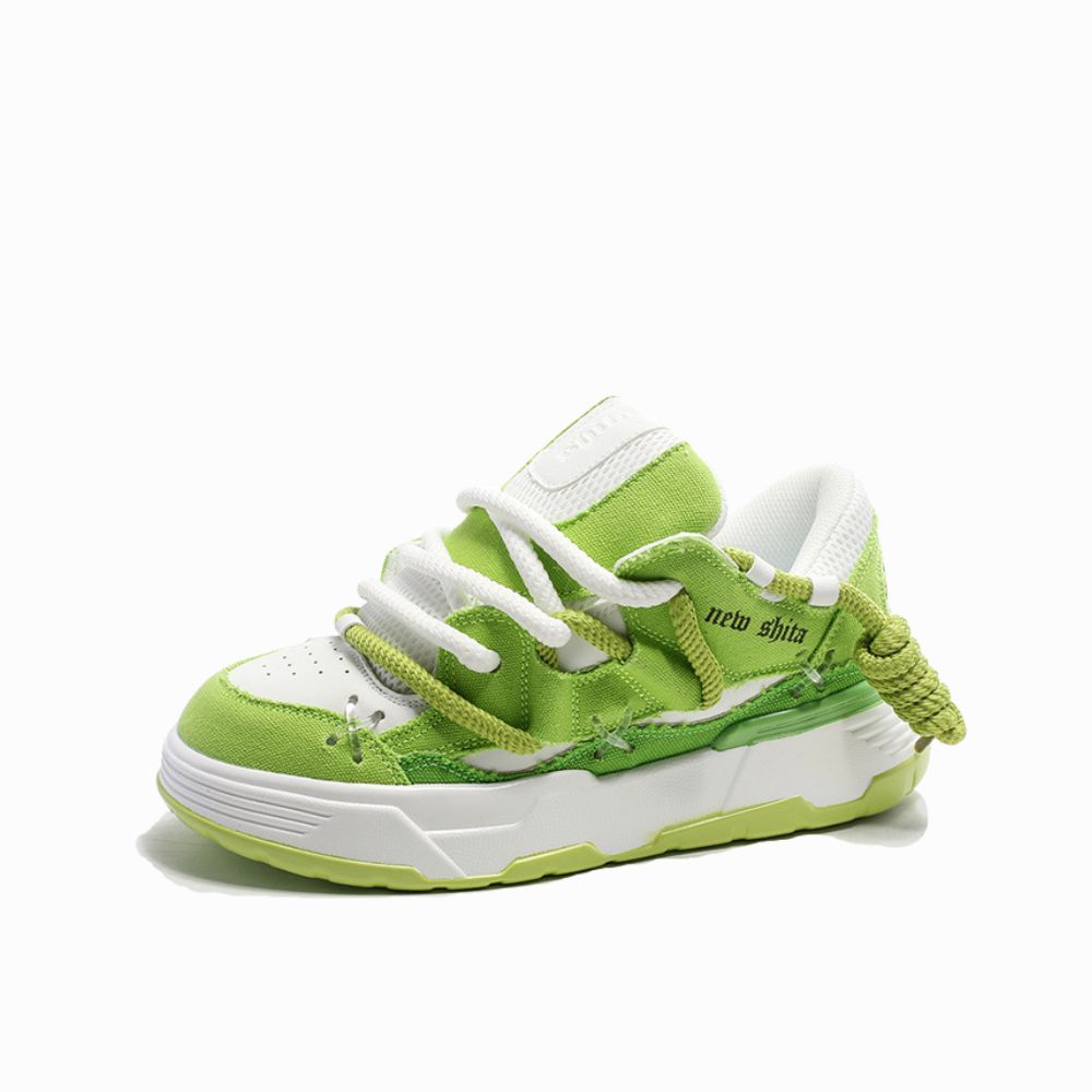 Green and white sneaker with 'new shita' branding on a white background
