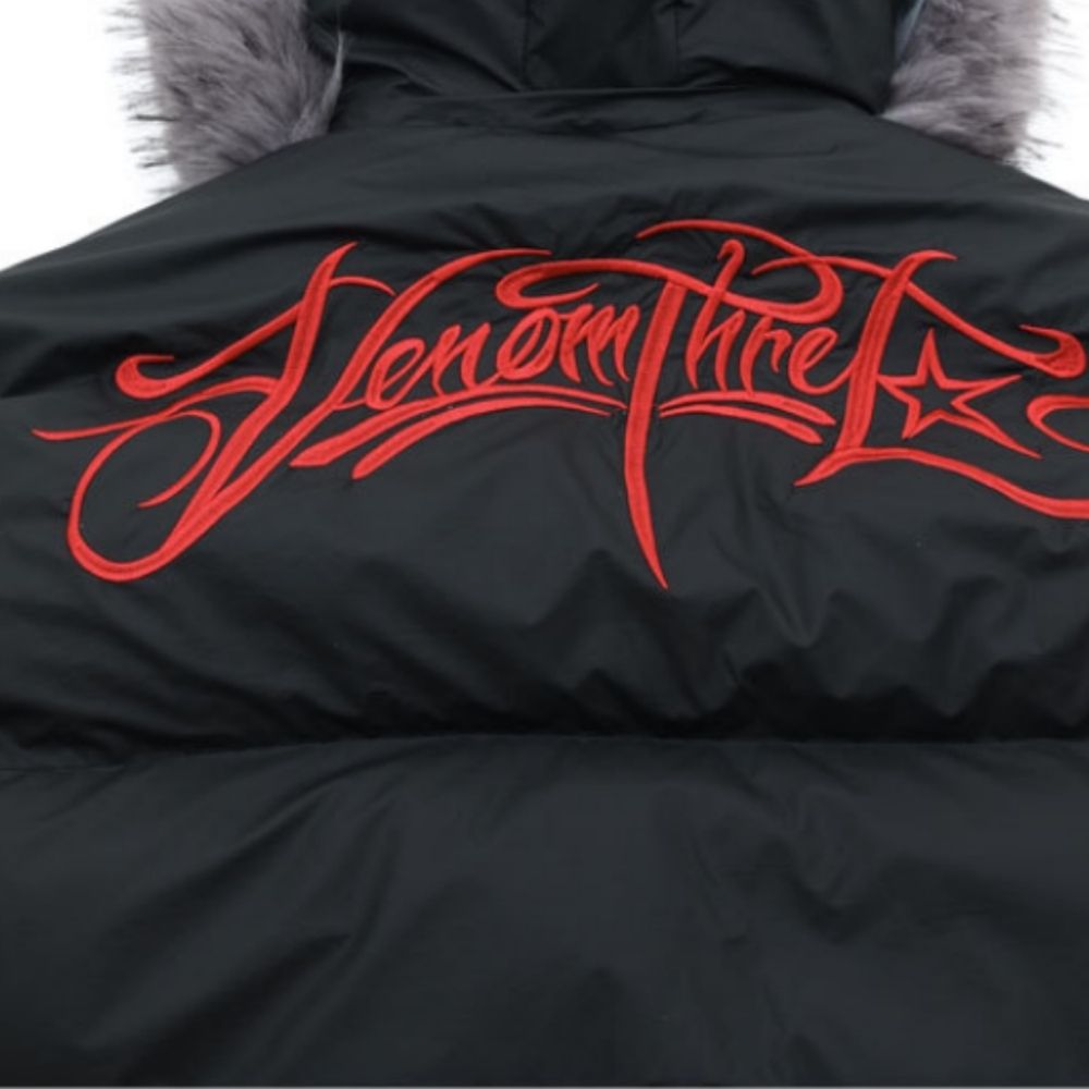 Black puffer jacket with red text on a white background