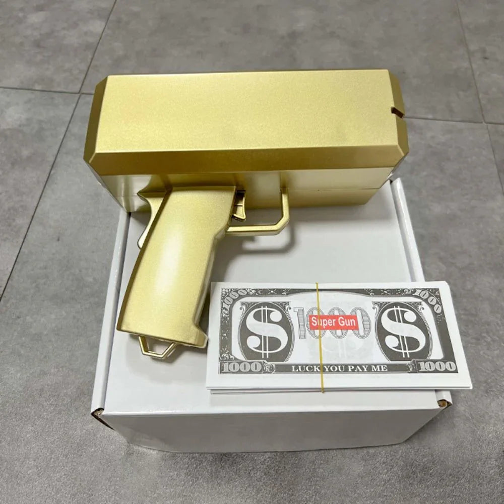 Gold toy gun with a stack of dollar bills labeled 'Super Gun' on a gray floor.