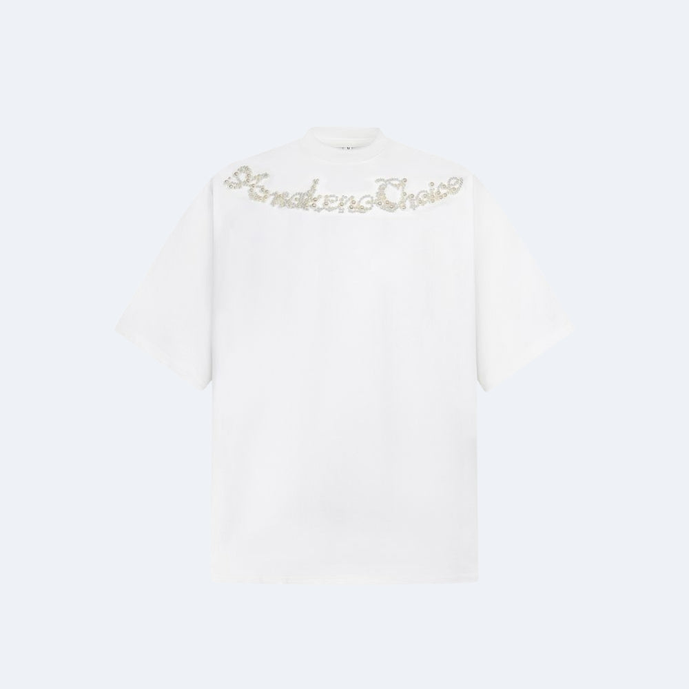 White. A white short-sleeve t-shirt with Be makers Choose written across the chest in sparkling gold lettering.