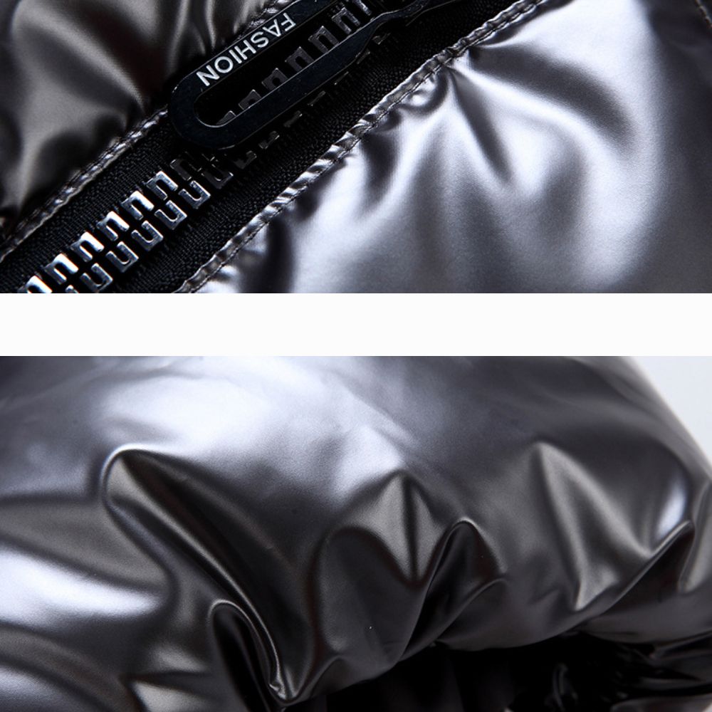Close-up of a shiny black jacket with a zipper, showing texture and brand name.